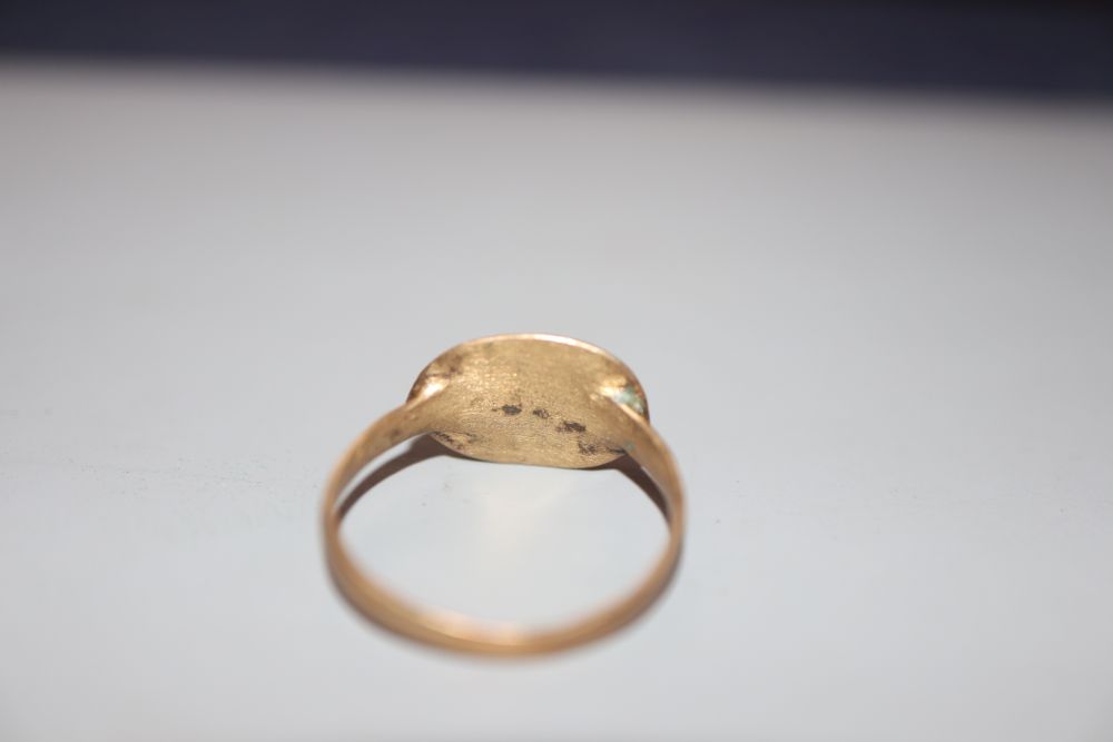 An antique base metal and bronze ring, with monogram, size P,